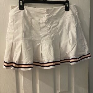White Pleated Skirt with Striped Hem